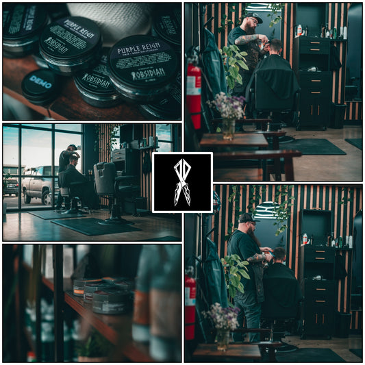 Obsidian Salon In Coeur D'Alene Idaho interior featuring stylist working and grooming products displayed.